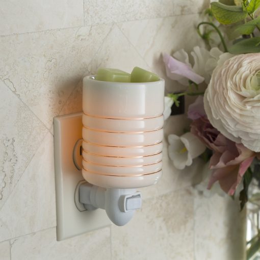Serenity Pluggable Fragrance Warmer plugged into power point on wall